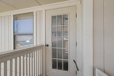 Welcome to this top-floor end-unit condo in Cypress Bay, located - photo 3