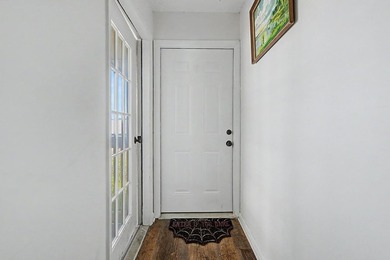Welcome to this top-floor end-unit condo in Cypress Bay, located - photo 4