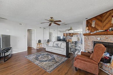 Welcome to this top-floor end-unit condo in Cypress Bay, located - photo 6