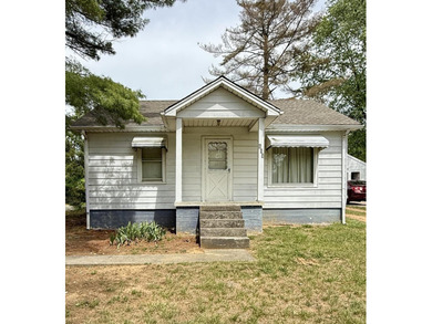 Cute and cozy 2 bedroom, 1 bath home with charming retro - photo 1