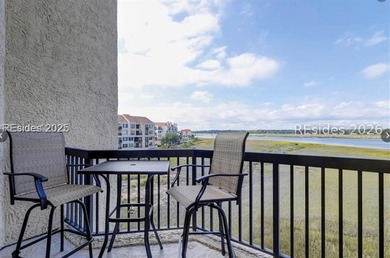 Spectacular waterfront location & view! 202 Captains Quarters is - photo 2
