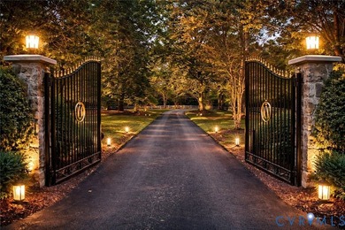 Set on 42 private acres behind a gated entrance, this - photo 3