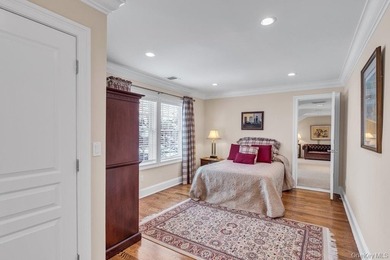 This Flower Hill Center Hall Colonial spans 3,600 square feet - photo 24