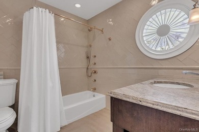 This Flower Hill Center Hall Colonial spans 3,600 square feet - photo 26