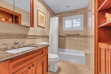 This Flower Hill Center Hall Colonial spans 3,600 square feet - photo 29