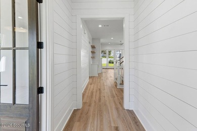 Experience elevated coastal living in this exceptional newly - photo 18