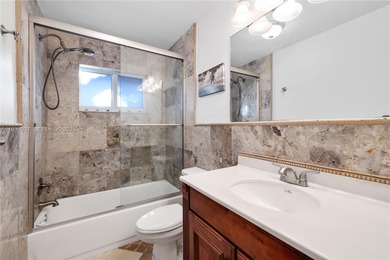 Welcome to this stunning fully furnished 3-bedroom, 2-bath