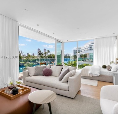 This one-of-a-kind, two-story waterfront villa, designed by - photo 8