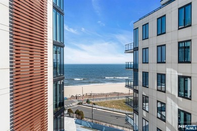 Elevated in every sense, this high-floor residence offers the - photo 1