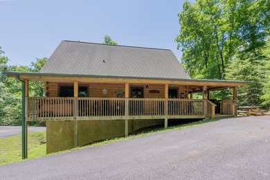 Want the Lake Life? This is it! This 2 bedroom, 2 bath cabin is - photo 2