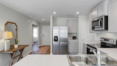 Welcome to The Meadows at Wildwood Village. Residents will enjoy - photo 3