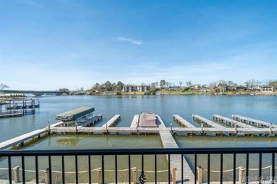 Experience lake living at its finest with this beautiful walk-in