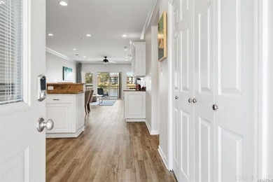 Experience lake living at its finest with this beautiful walk-in