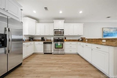 Experience lake living at its finest with this beautiful walk-in