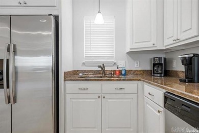 Experience lake living at its finest with this beautiful walk-in