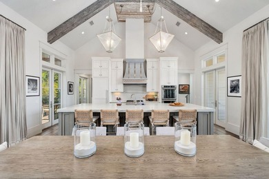 Tucked within the private, gated sanctuary of Four Mile Village - photo 12