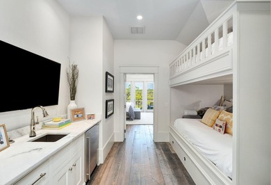 Tucked within the private, gated sanctuary of Four Mile Village - photo 21