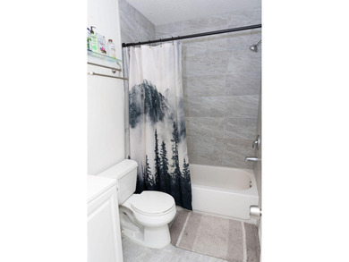 This charming home features updated kitchen and bathrooms with - photo 27