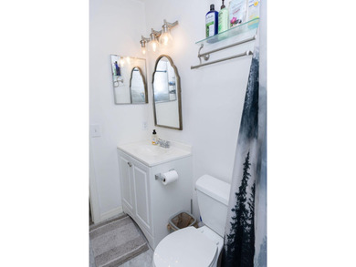 This charming home features updated kitchen and bathrooms with - photo 29