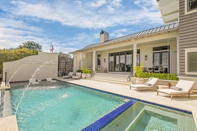 Tucked within the private, gated sanctuary of Four Mile Village - photo 30