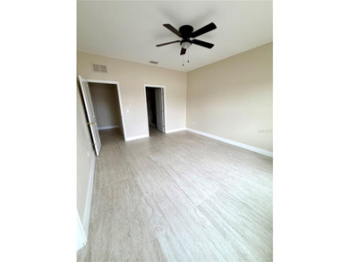 This 4/2 home has a renovated interior showcasing modern - photo 11