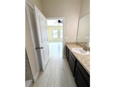 This 4/2 home has a renovated interior showcasing modern - photo 12
