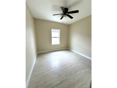 This 4/2 home has a renovated interior showcasing modern - photo 13