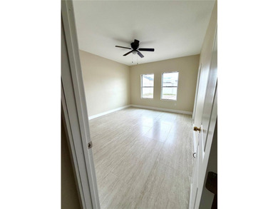 This 4/2 home has a renovated interior showcasing modern - photo 16