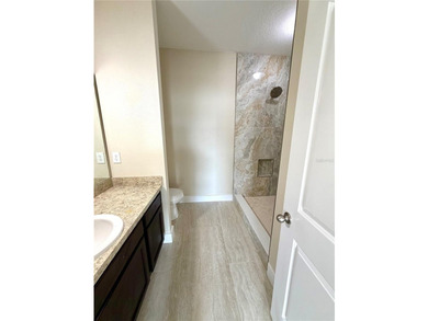 This 4/2 home has a renovated interior showcasing modern - photo 17