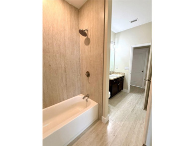 This 4/2 home has a renovated interior showcasing modern - photo 18
