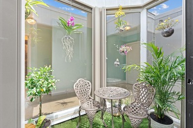 Welcome home to this spacious 3-bed, 2-bath corner Villa in a - photo 12