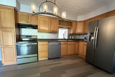 Welcome to this immaculately kept brick ranch in the Pretty - photo 3