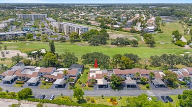 Welcome home to this spacious 3-bed, 2-bath corner Villa in a - photo 39