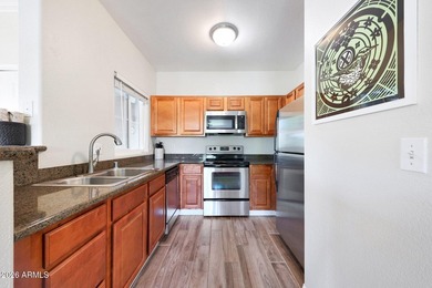 Welcome home to this ground-level 1 BD | 1 BA condo located in - photo 5