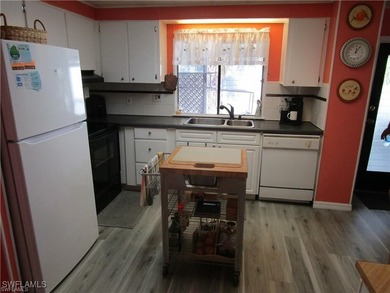 This charming turnkey 2 bedroom, 2 bath home is situated in the - photo 16