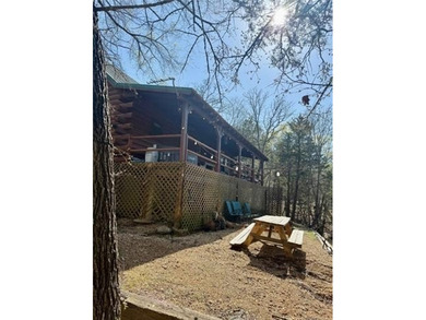 Cozy Log Cabin Tucked Away in the Trees Take the steps down to - photo 16