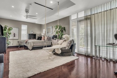 This stunning contemporary home sits gracefully on a prominent - photo 22