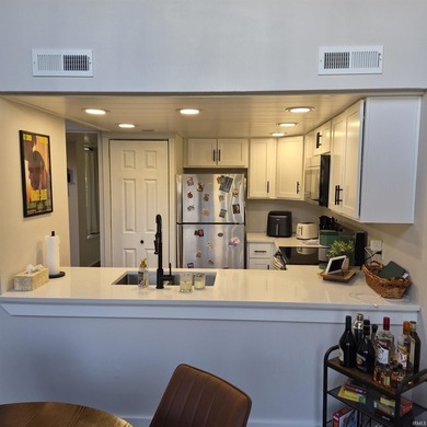 Don't miss this freshly remodeled 2 bedroom 1 bath Condo, new - photo 7