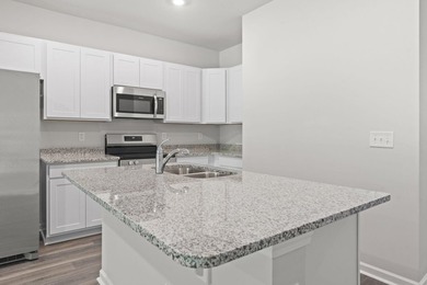 Two-story, three-bedroom, three-bathroom Glenville townhome with - photo 6