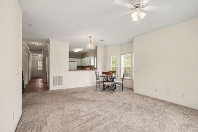 Enjoy beautiful golf course views from this bright and spacious - photo 3