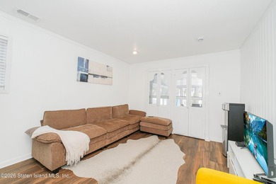 Welcome to 191 Suffolk Avenue, a warm and inviting two-family - photo 13
