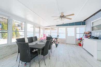 Welcome to 191 Suffolk Avenue, a warm and inviting two-family - photo 15