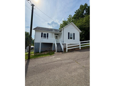 This two story home provides year round and seasonal views of - photo 1