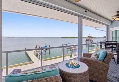 WELCOME TO 547 JOHNS PASS AVENUE A RARE OPEN WATER ESTATE - photo 3