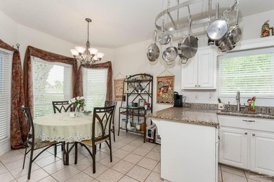 Enjoy peaceful golf course living in this well-maintained - photo 9
