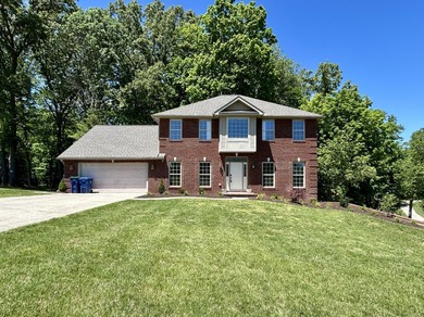 Welcome to this beautiful two-story brick home located in the - photo 1