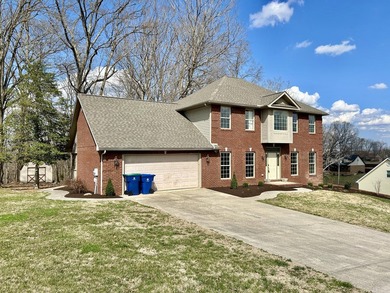 Welcome to this beautiful two-story brick home located in the - photo 3