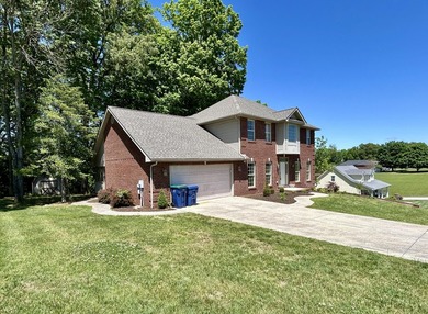 Welcome to this beautiful two-story brick home located in the - photo 5