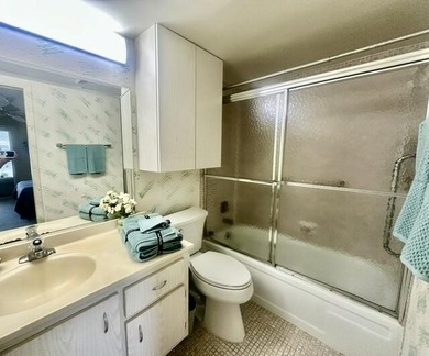 Immaculate 2-bed, 2-bath third-floor condo offering stunning - photo 11