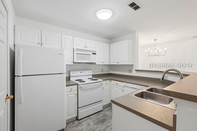 Welcome to this beautifully updated 3-bedroom, 2-bath villa - photo 8